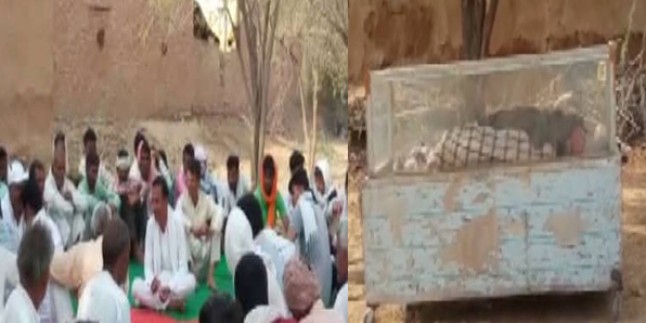कर्ज से परेशान किसान ने की आत्महत्या, शव के साथ बैठे हैं धरने पर लोग