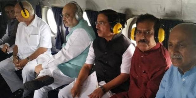 कर्नाटक पहुंचे अमित शाह, बाढ़ प्रभावित इलाकों का किया हवाई सर्वेक्षण