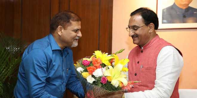 PU VC meets HRD Minister
